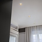 Kap80SurfaceRoundMainsDimmingOpticFloodDybbrunGuldFlos-01